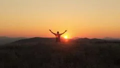 Young Man Worship On a Beautiful Sunset