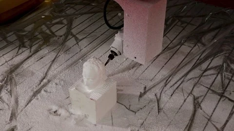 056 production of a 3d model of the head made of foam on a five-axis cnc mac Stock Footage 154897577