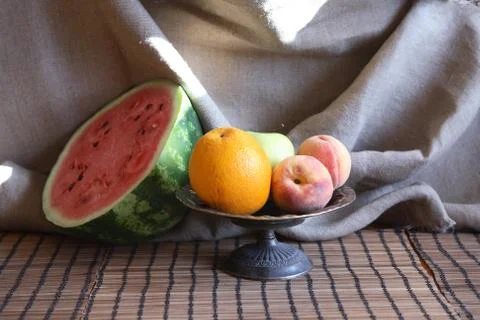 Still  life  with  various  fruits  in  metal  bowl  near  sliced  watermelon xkwx Fruit,  Berry,  Watermelon,  Food,  Summer,  Plant,  Healthy  Eating,  Dessert,  Background,  Macro,  Closeup,  Red,  Slice,  Cut,  Portion,  Plate,  Table,  Dishware,  Morning,  Breakfast,  Bowl,  Still  Life,  Bowl,  Peach,  Apple,  Orange,  Canvas,  Decoration,  Interior,  Vintage,  Retro