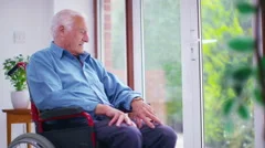4K Caring young home support worker with elderly gentleman in his home