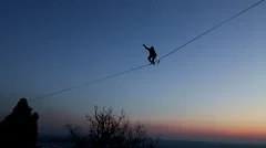 Risk Taking Extreme Tight Rope Walker Accomplishes Dangerous High-Wire Feat