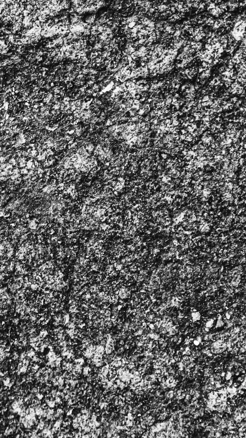 057_Detailed rough stone texture background.mp4 Stockbeeldmateriaal 345817500