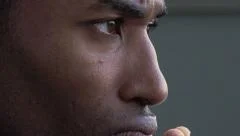 closeup side footage of depressed and worried black businessman: afro-american