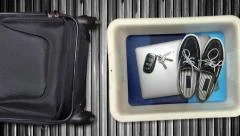 Passenger Items in TSA Airport X-Ray Bins