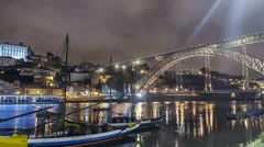 Porto, Portugal old town skyline on the Douro River with rabelo boats timelapse