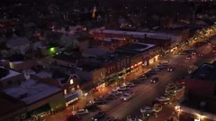 Aerial shot of small town USA during Christmas season at night