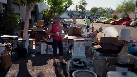 06-01-2024 - Tucson, AZ, USA - People at a rummage sale Stock Footage 276670631