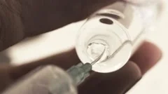 Nurse Filling Injection Syringe From Vial, Slow Motion