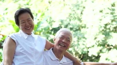 Asian senior couple stay together after retirement. hug and cuddle with love