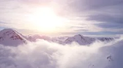 Epic Aerial Flight Through Mountain Clouds Towards Sunrise Beautiful Morning