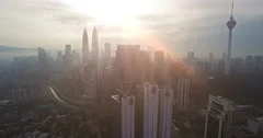 Aerial view of Kuala Lumpur city in Malaysia capital, tall buildings. Cinematic