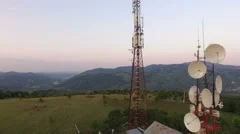 Aerial view over Cellphone radio telecommunication tower