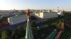 Flight over Moscow Kremlin Star near Red square. City center, downtown. Day road