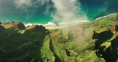 Aerial view flying over jungle mountain peaks, Na Pali coast Kauai