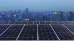 Solar farm with twilight city time lapse