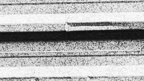 063_Horizontal stack of rough textured material.mp4 Stock Footage 346067349