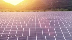 Sunset Over Field Solar Panels Farm Aerial Flight Green Renewable Energy