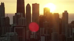Aerial sunrise silhouette view of Chicago city skyline USA