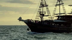 old wooden ship sailing  at sea in slow motion
