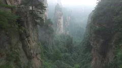 CINEMATIC AERIAL TILT FLY BY OF ZHANGJIAJIE AVATAR MOUNTAINS IN HUNAN CHINA
