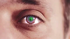 Robotic eye, Futuristic cyborg eye with graphics in it. HD video