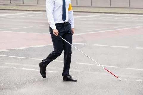 Blind Person With White Stick Walking On Street xkwx accessibility, adult, arm, armband, assistance, band, blind, blindness, cane, care, close-up, closeup, cross, crossing, depend, disability, guidance, guide, handicap, handicapped, health, healthcare, holding, icon, leisure, man, necktie, one, outdoor, people, person, protect, protection, road, safe, safety, sick, sickness, sign, stick, street, symbol, tie, vision, walking, yellow, young