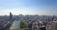 Beautiful Osaka City Skyline aerial backwards reveal shot