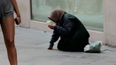lady street beggar poor homeless old woman holding cup