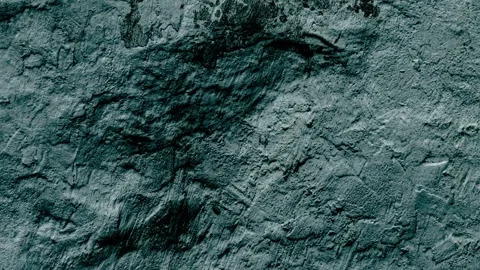 066_Rough textured wall pattern close-up.mp4 Stock Footage 346974099