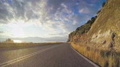 POV car travel vehicle driving coastal local road mediterranean rocky sunny