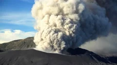 Mt Bromo active volcano erupting smoke and ash National Park Java Indonesia