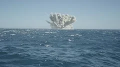 Animated powerful nuclear explosion in sea on a sunny day