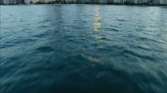 Chicago, USA - September 2016: Aerial sunlight sunset Waterfront Reveal of Lake
