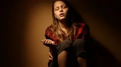 Teen girl. Drug addiction. Depressed face of a teen girl with overdose 