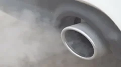 Exhaust gases from the muffler running car