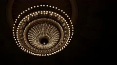 Chandelier in the theater extinguishing