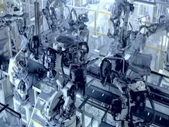 Robots are welding car in automobile factory