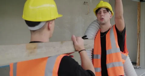 07 Funny Moment With Construction Workers Working In New Building Stock Footage 162842637