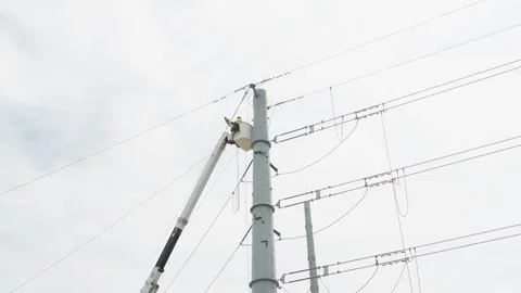 07-June-2026 Georgetown, TX linemen working on power pole from bucket lift Stock Footage 336618470