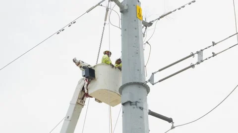 07-June-2026 Georgetown, TX linemen working on power pole from bucket lift Stock Footage 336618901