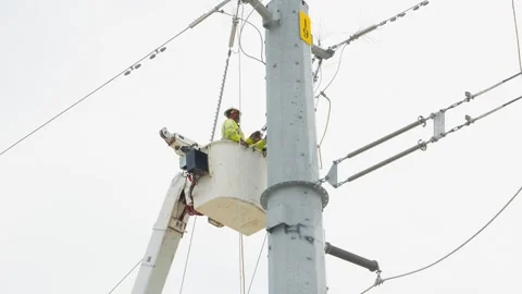 07-June-2026 Georgetown, TX linemen working on power pole from bucket lift Stock Footage 336619035