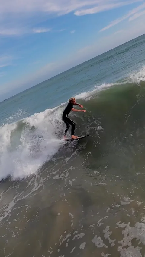 070326 San Clemente Surfer almost lands an aerial spin attempt 9x16 Stock Footage 338305778