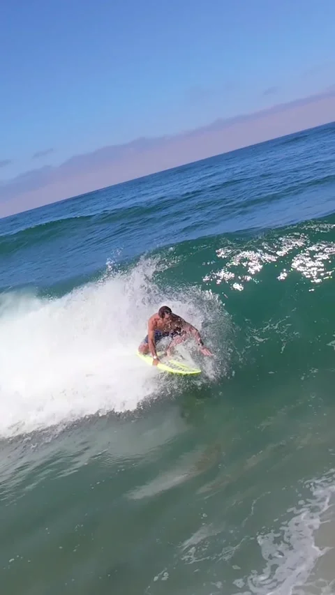 070626 Encinitas Surfer - 04 - rat quick right coverup closeout 9x16 Stock Footage 338370490