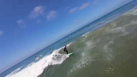 070626 Encinitas Surfer - 33 - green board good short left 4k Stock Footage 338370573