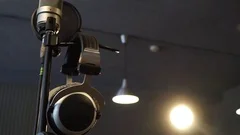 Slow motion, microphone in the recording studio, slidecam