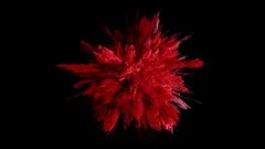 Cg animation of red powder explosion on black background
