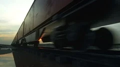 Freight train with cargo containers. Against Sunrise. logistic concept.