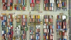 Global trade networks shipping containers from overhead