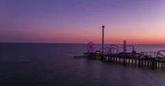 Aerial of Galveston Texas Beach Sunset at The Historic Pleasure Pier