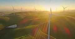 Aerial Flying over Renewable Energy wind farm Wind Turbines